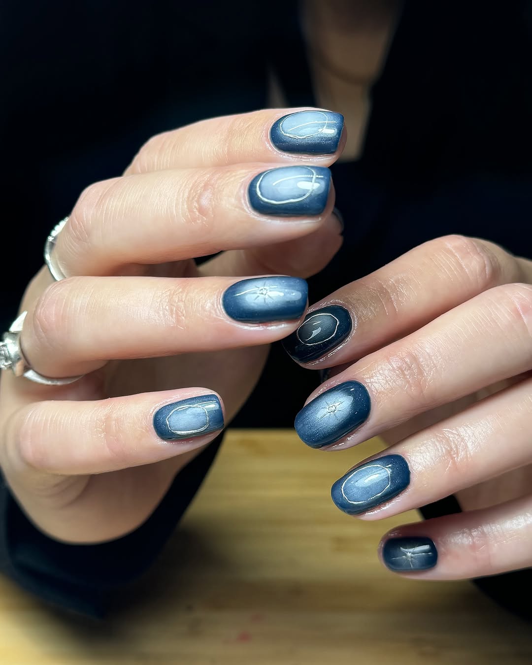 Cat eye blue and white ombre nails