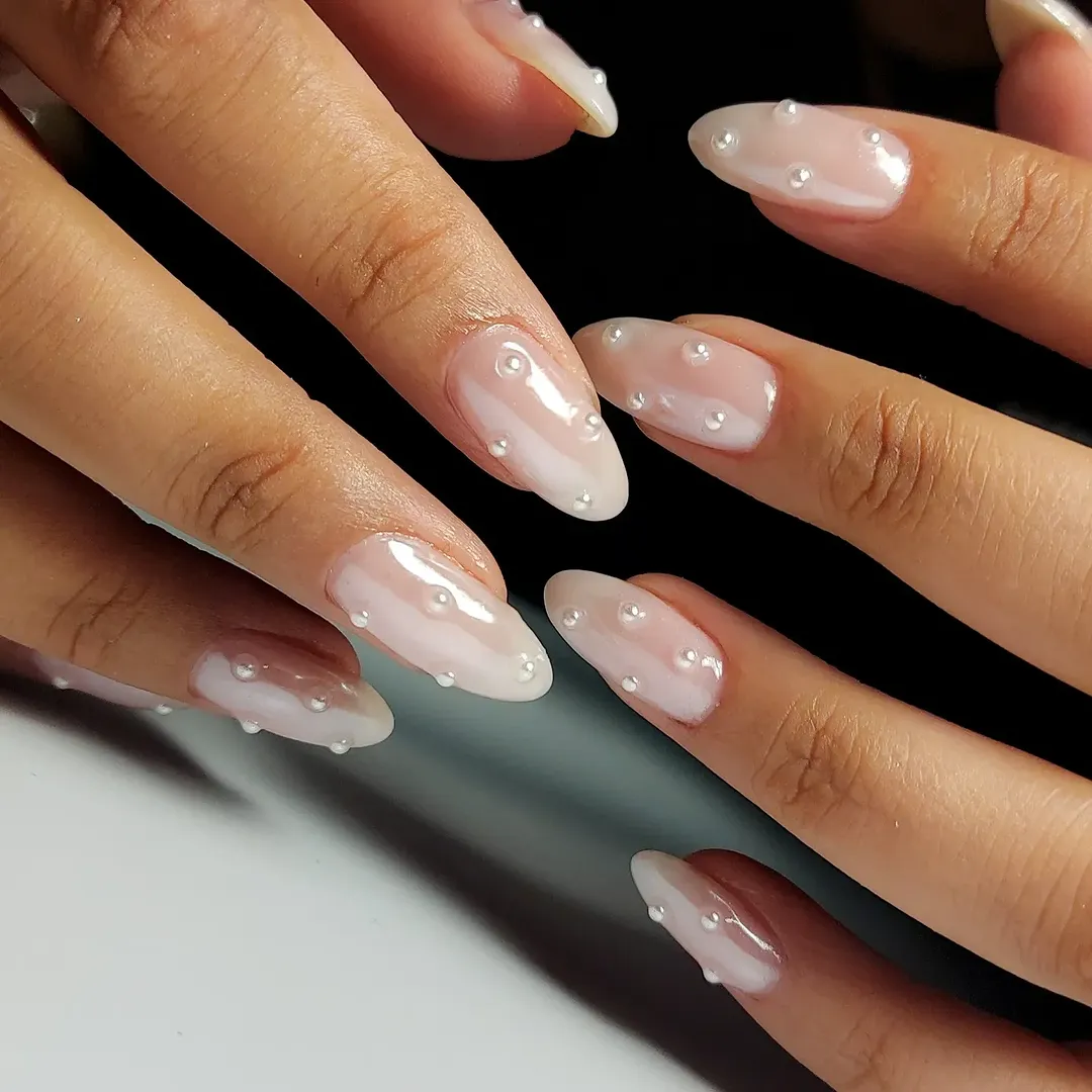 Glazed chrome ombre nails with coquette detail