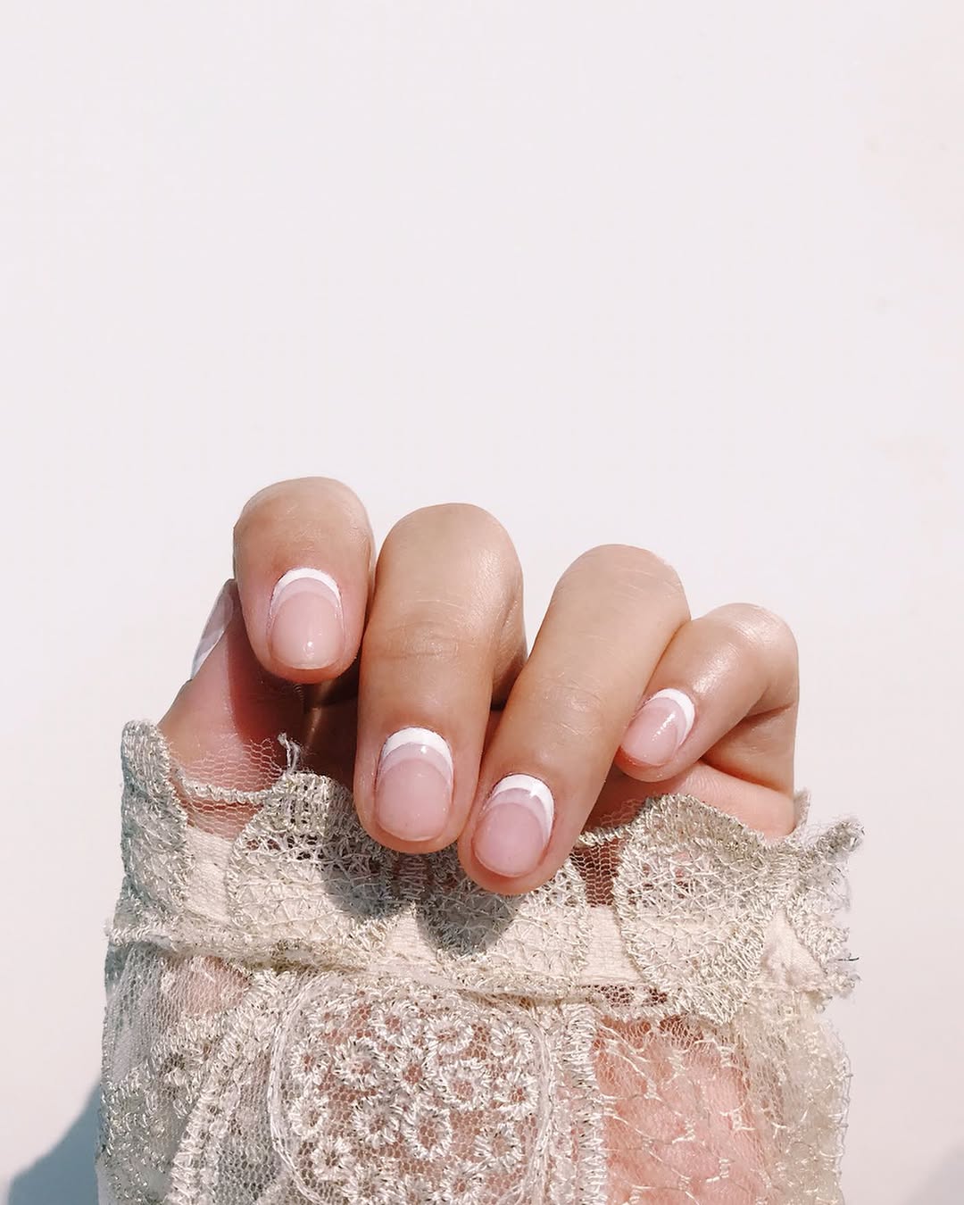 Upside down French white ombre nails