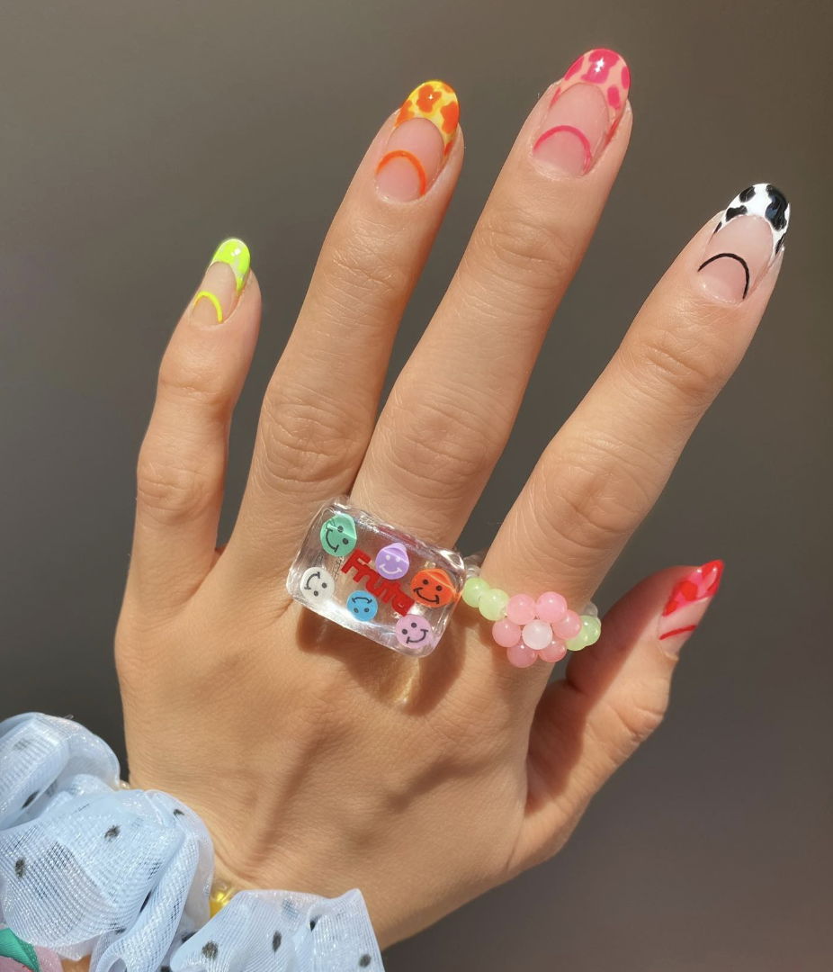 Animal print multicoloured French tip nails