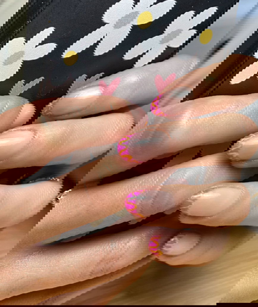 Hot pink and orange French tip nails