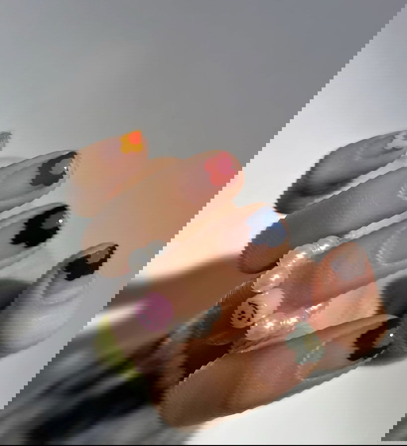 Multicoloured flower French tip nails