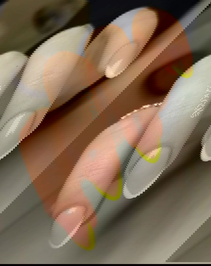 Neon yellow French tip nails