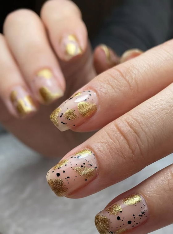 black nude and gold nails