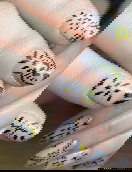 gold black and nude nails