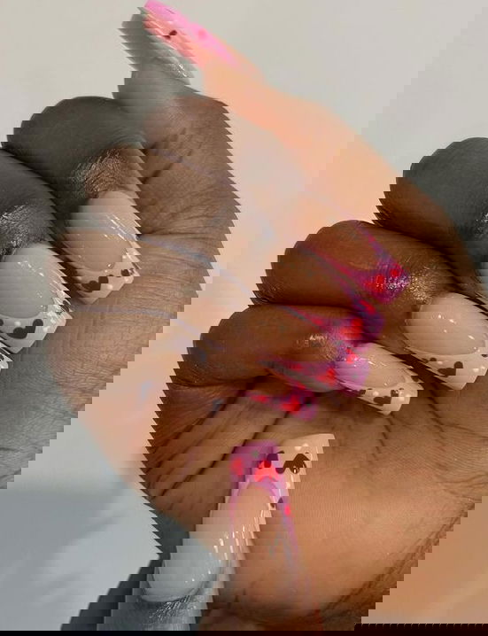 long pink french tips with hearts