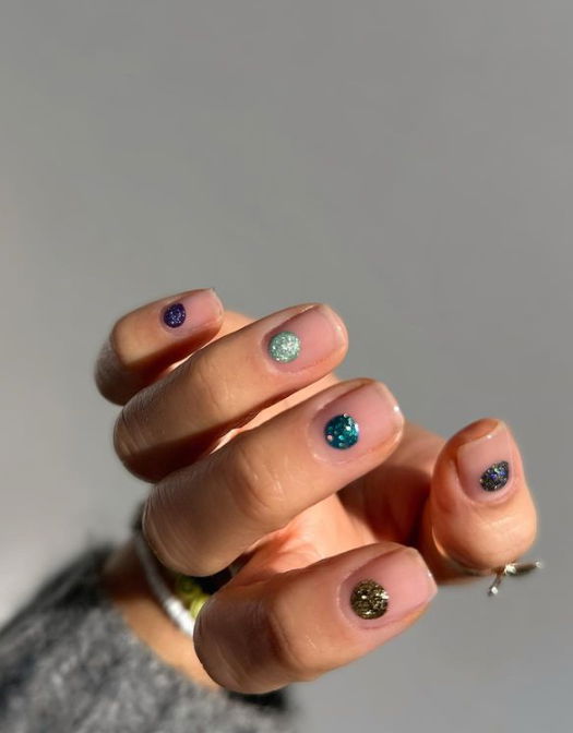 nude nails with large glitter dots