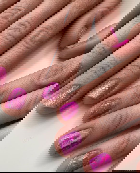 pink and purple marble nails with glitter