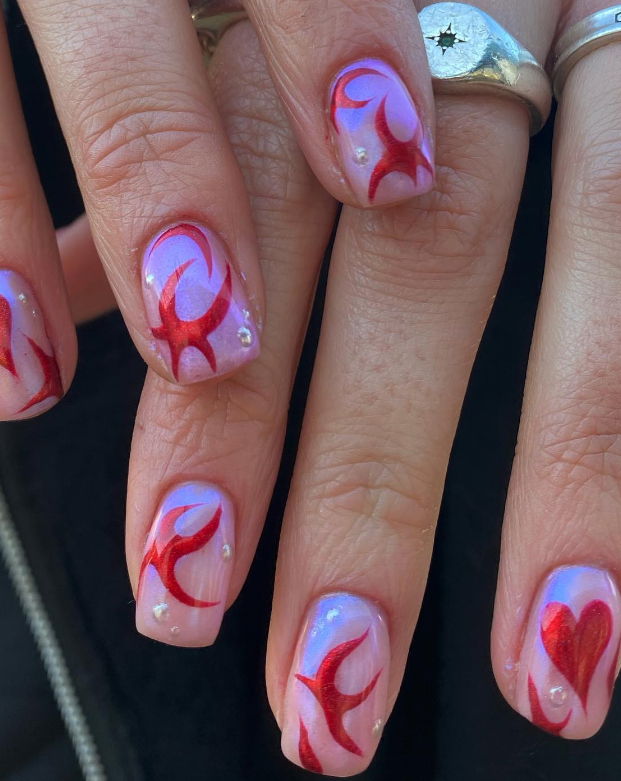 pink and red glazed donut nails