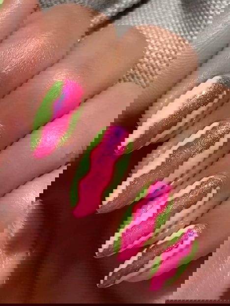 pink and yellow squiggle colour block nails