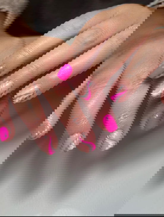 short square nails with pink and white swirls