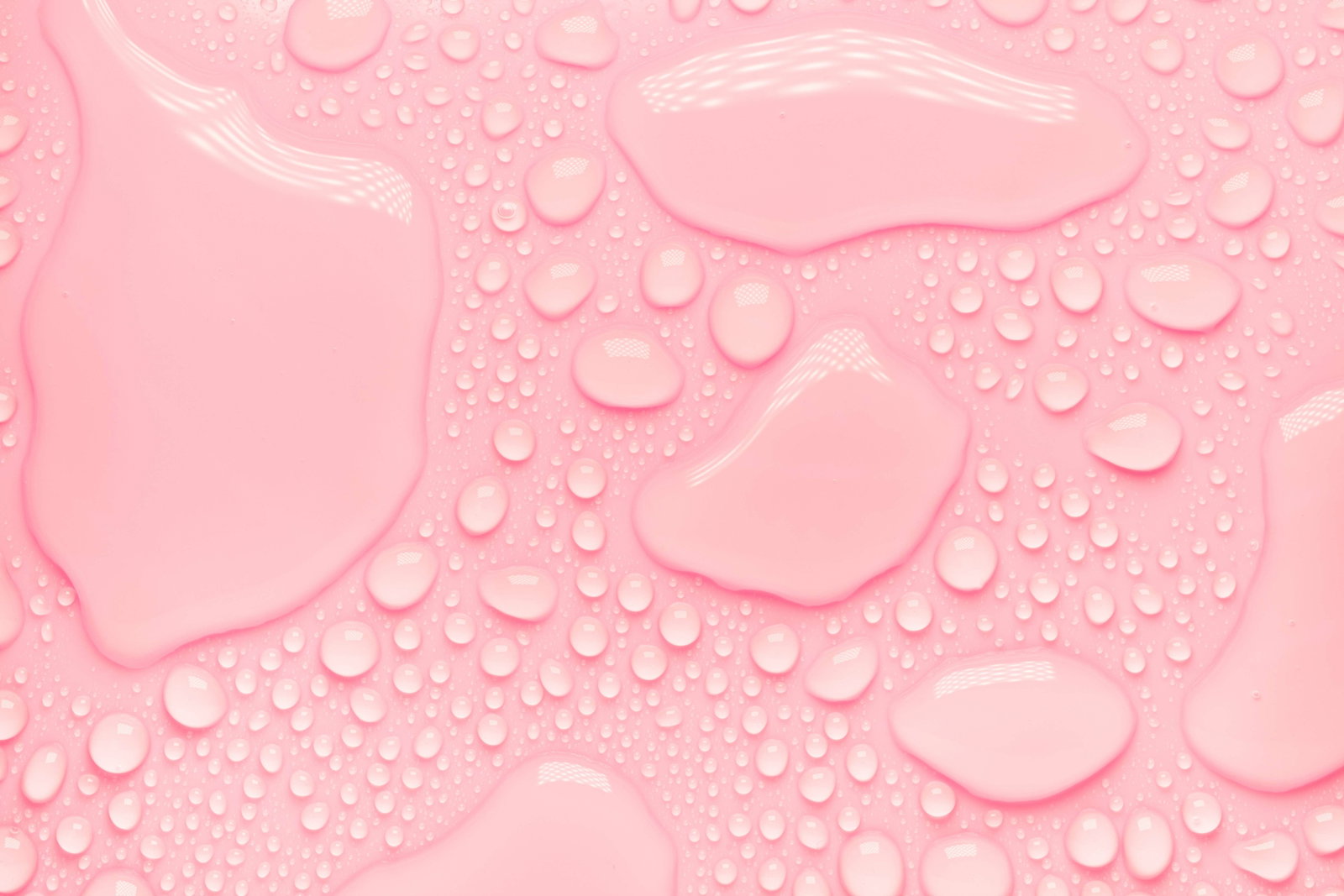 Cosmetic moisturizing liquid drops on pink pastel background To | Live That Glow how often can you use a facial steamer skin skincare
