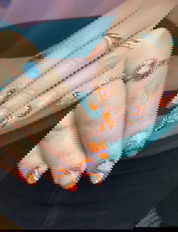 orange and purple round nails