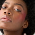 Woman showing how to pick the perfect blusher colour