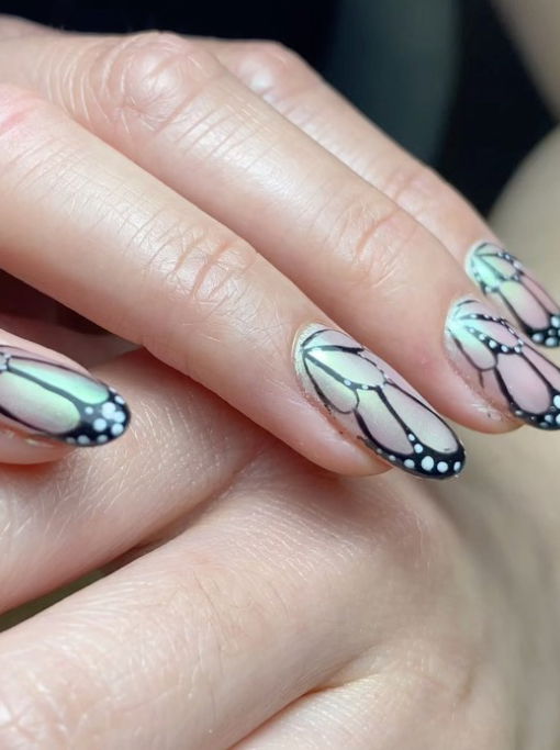 black butterfly chrome nails