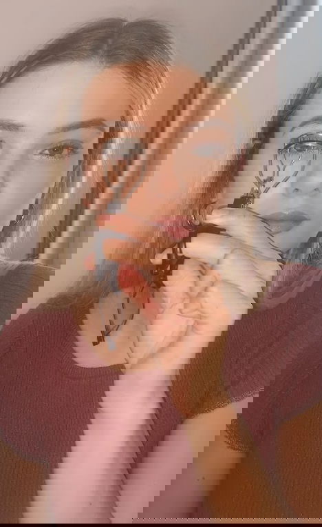 how to apply mascara image of curling eyelashes