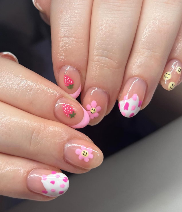 yellow and pink mismatched nails