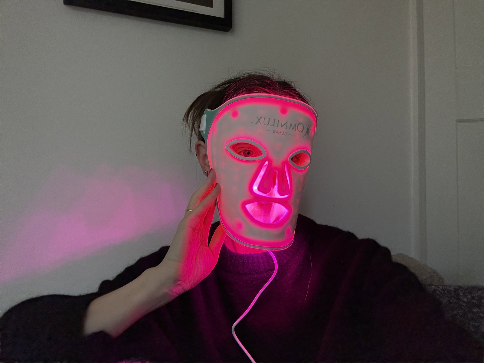 | Live That Glow Journalist Grace Day with LED face mask on