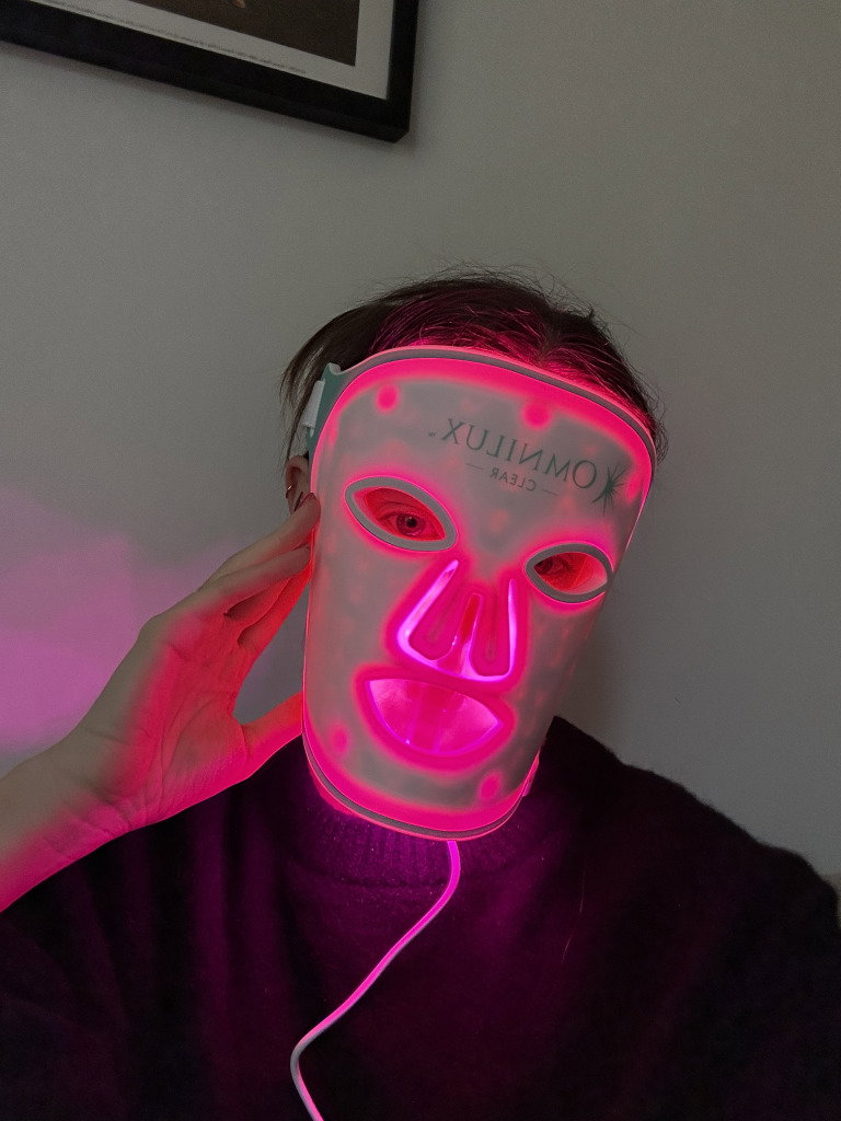 | Live That Glow Journalist Grace Day using an LED face mask