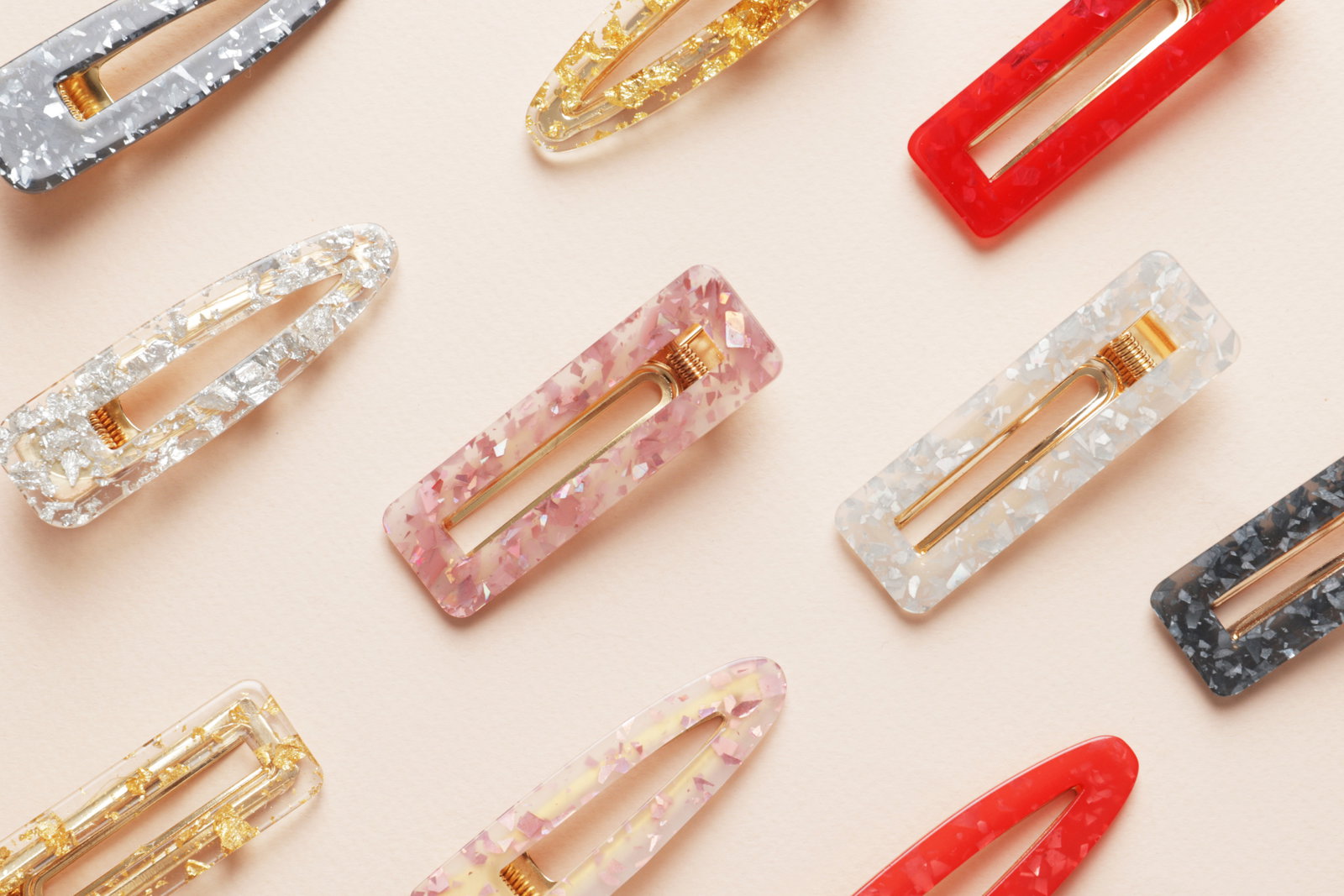 Hair clips showing importance of putting your hair up to prevent back and shoulder acne