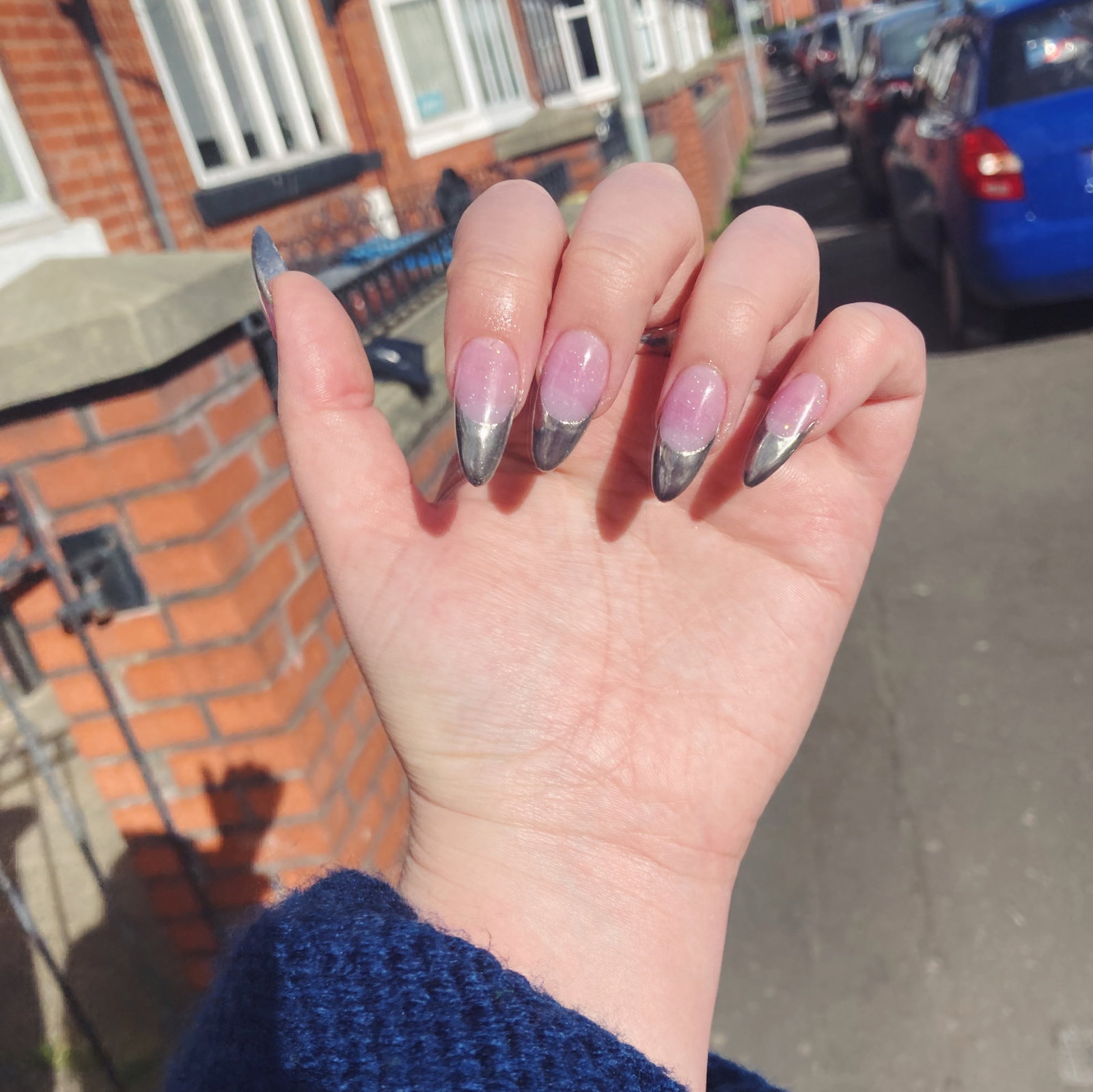 Journalist Annie Walton Doyle shows her silver nails