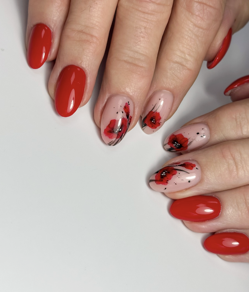 Classic red nails with poppy nail art