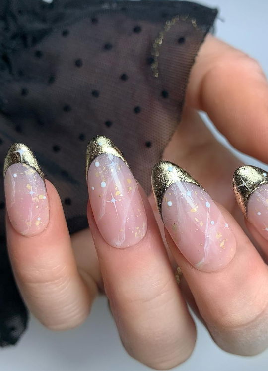 Gold chrome french tip nails with clouds