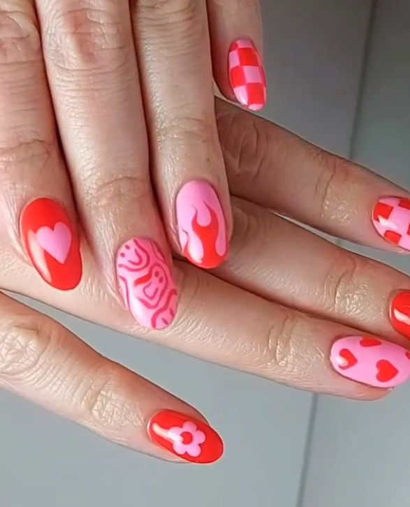 red and pink smiley face nails
