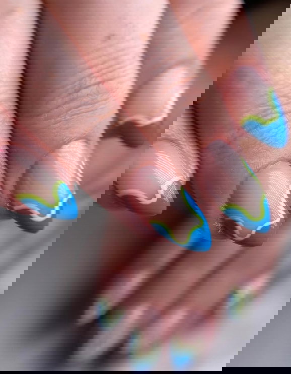wavy blue french tip nails