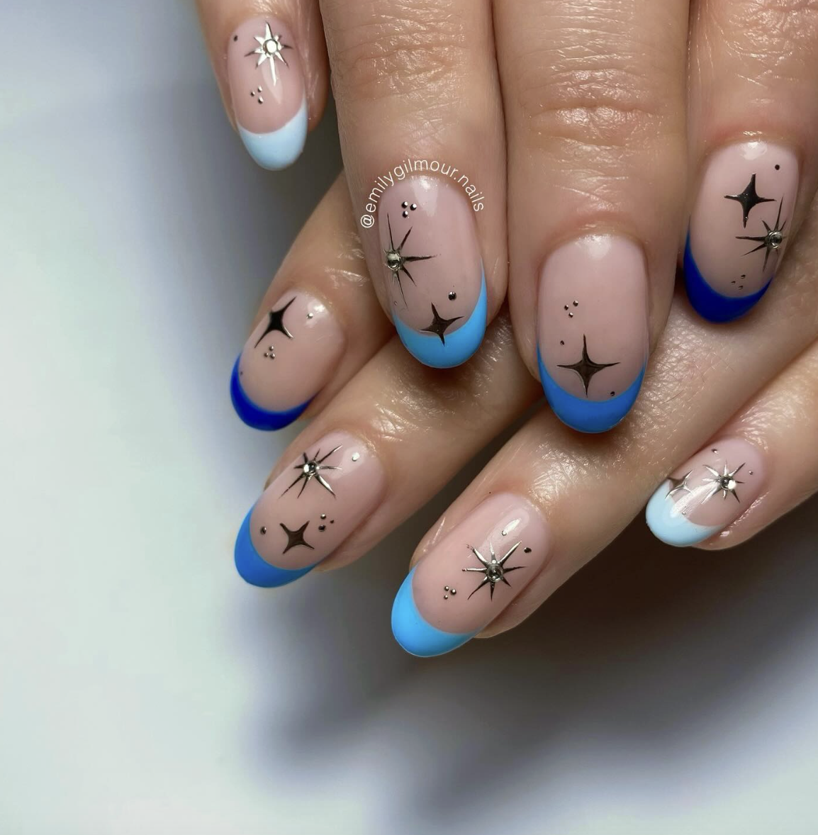 Blue acrylic French tips with gold stars | Live That Glow Blue acrylic French tips with gold stars