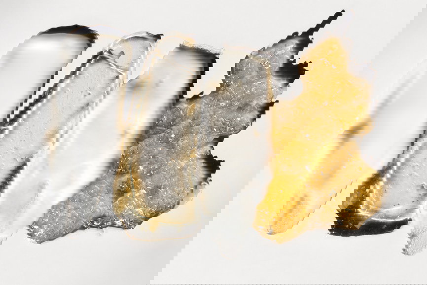 Overhead shot of a series of skincare product such as creams, serums and scrubs