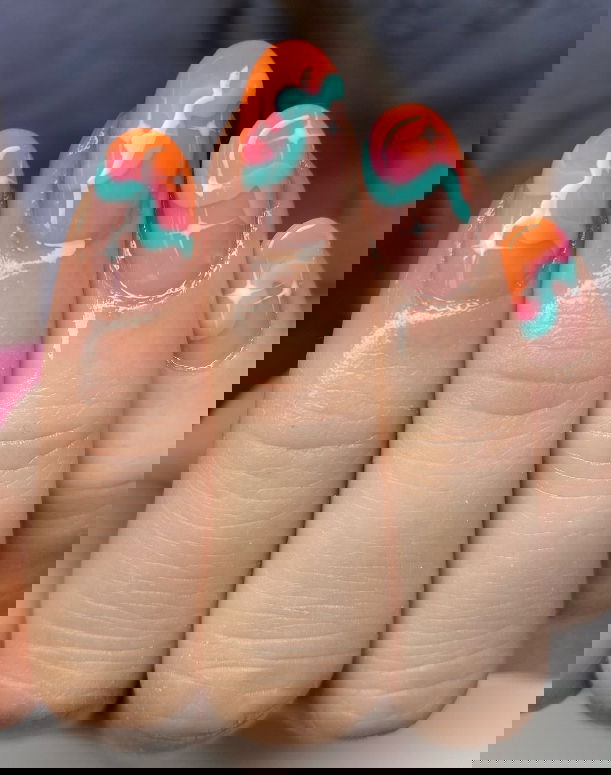 abstract orange pink and turquoise cloud french tip nails