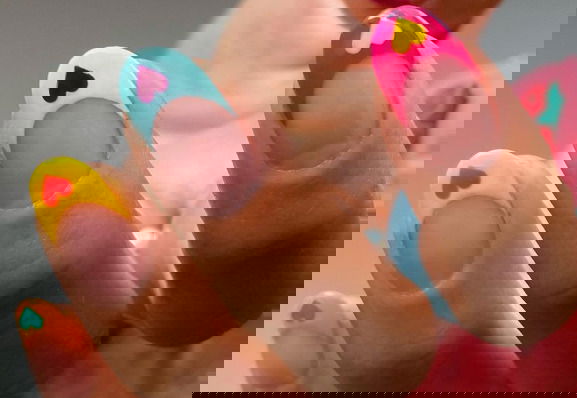 bright French tip nails with hearts hang