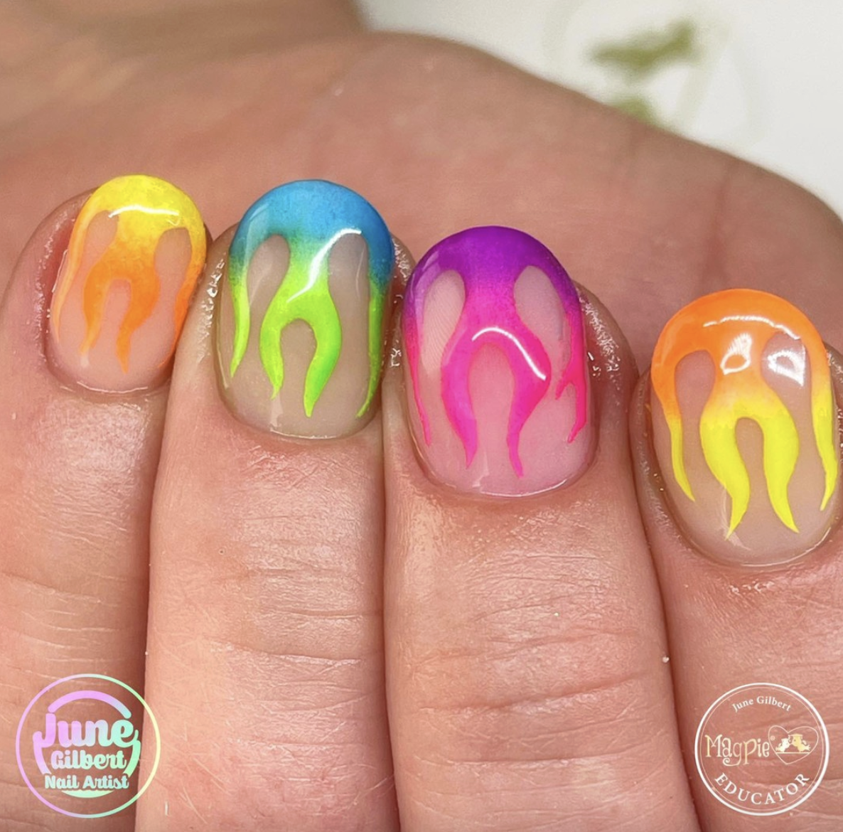 neon-flame-nails | Live That Glow Nude nails with colourful neon flame designs in pink, orange, yellow, green and blue
