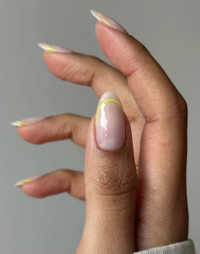 neon-yellow-micro-french-tip-nails | Live That Glow Glossy nude almond nails with fine neon yellow micro French tips