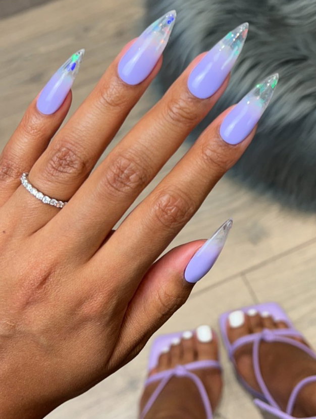 purple stiletto nails with glitter tips