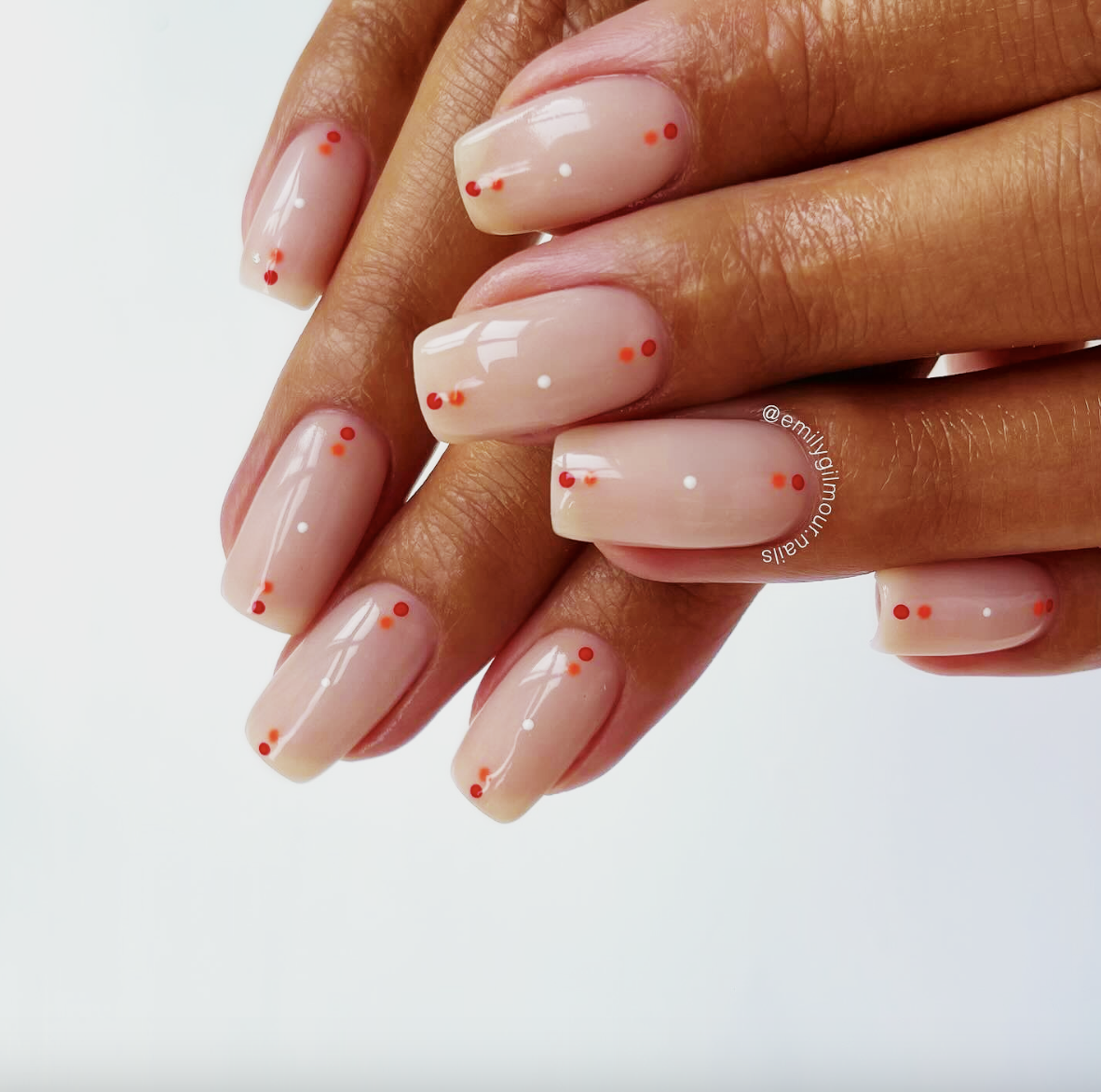 simple-neon-dot-nails-emily-gilmour | Live That Glow Nude square nails with tiny red and orange neon dot nail art