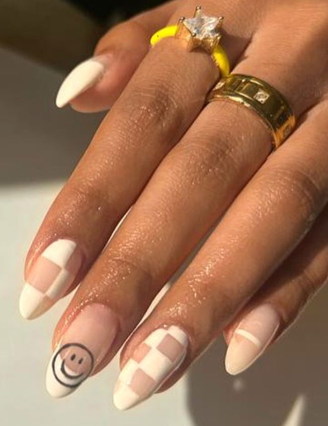 white and nude checkered nails