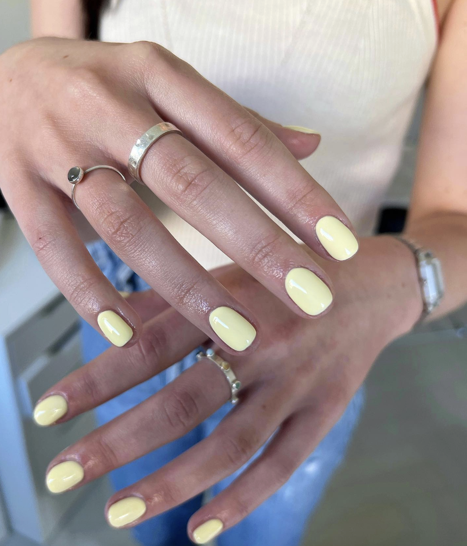 yellow-neon-nails | Live That Glow Short rounded nails painted in a glossy bright yellow neon shade