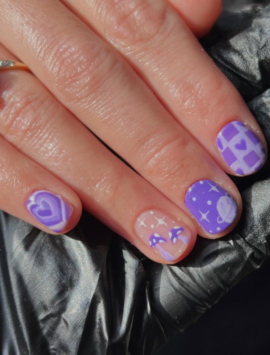cosmic purple nails