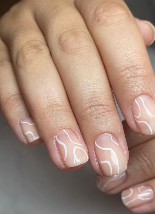 nude and white swirl nails nona