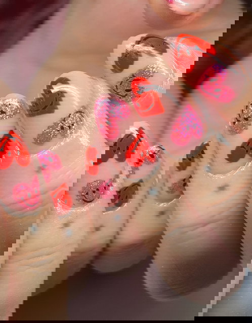 red and pink hearts with faces