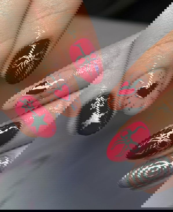 red and silver mismatched manicure