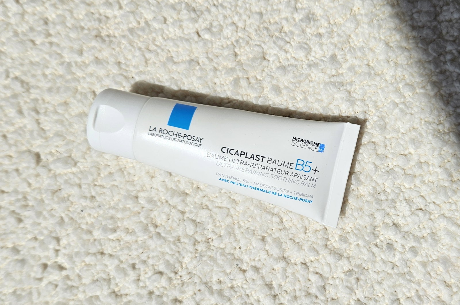 Close-up of La Roche-Posay Cicaplast Baume B5+ balm tube