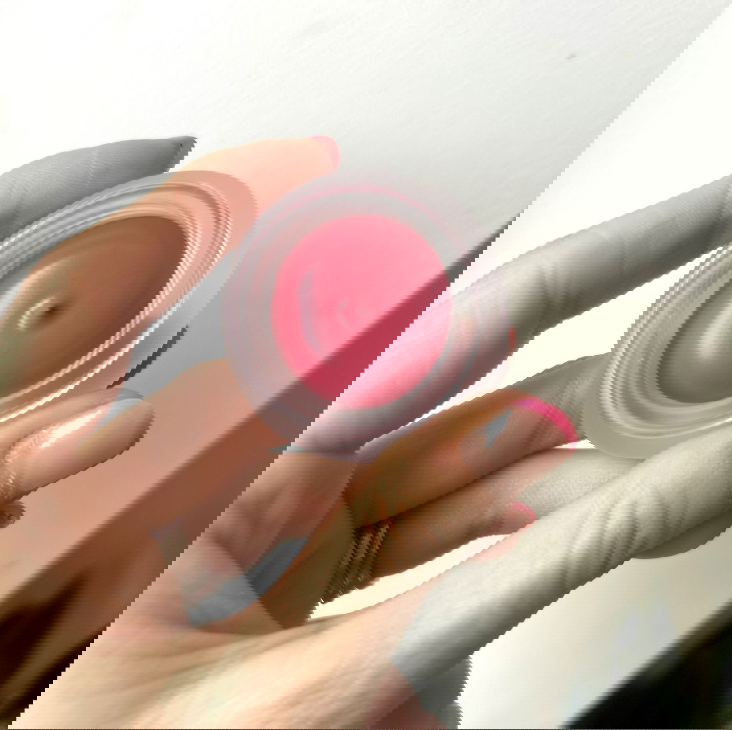 Fwee Lip & Cheek Blurry Pudding Pot in shade Oh! held in hand