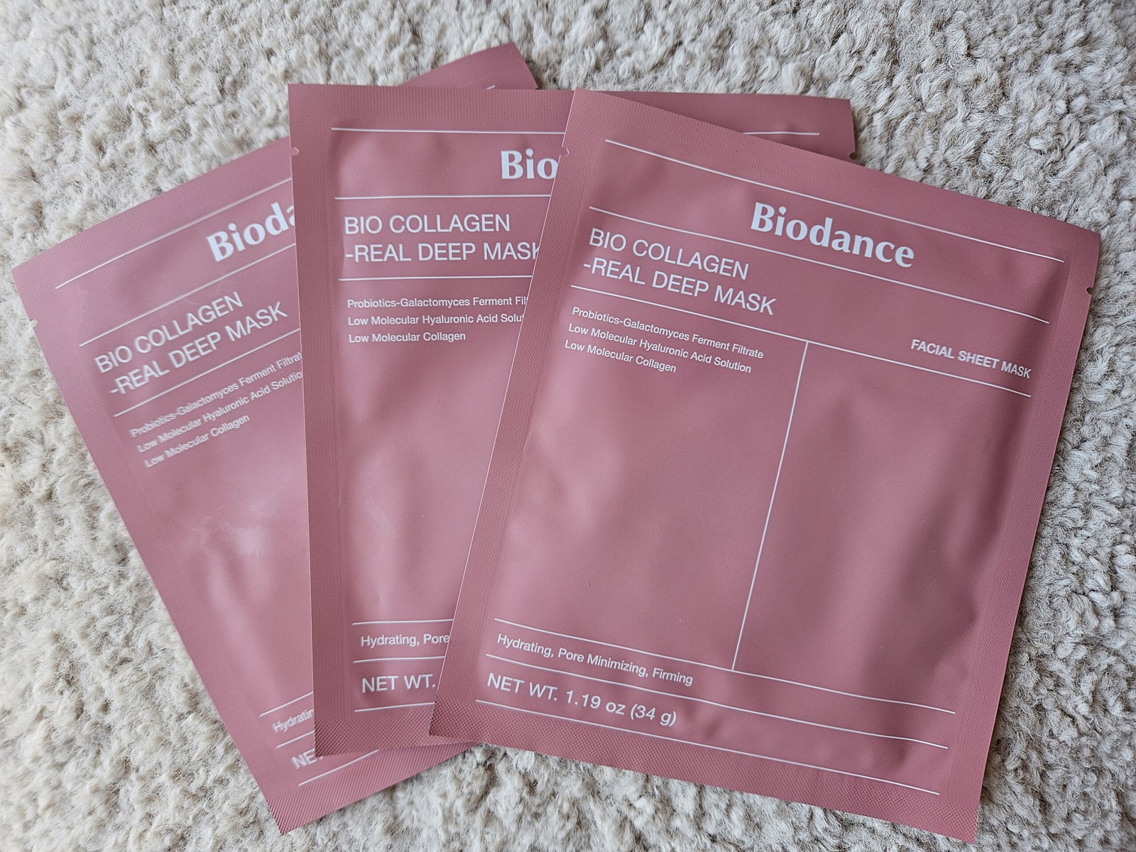 Three individually packaged Biodance Bio Collagen Real Deep hydrogel masks.