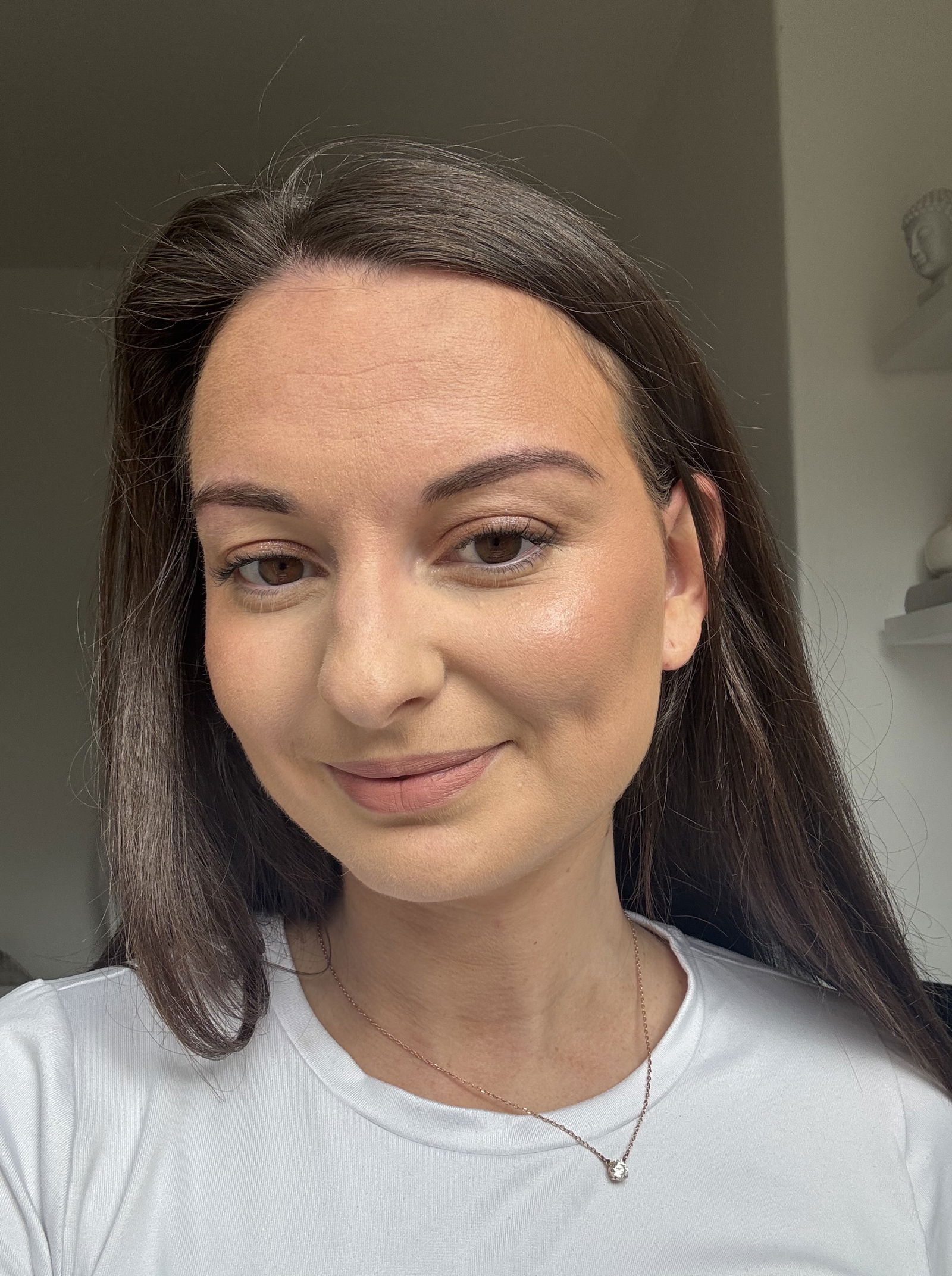 Beauty journalist wearing Charlotte Tilbury's Beauty Light Wand
