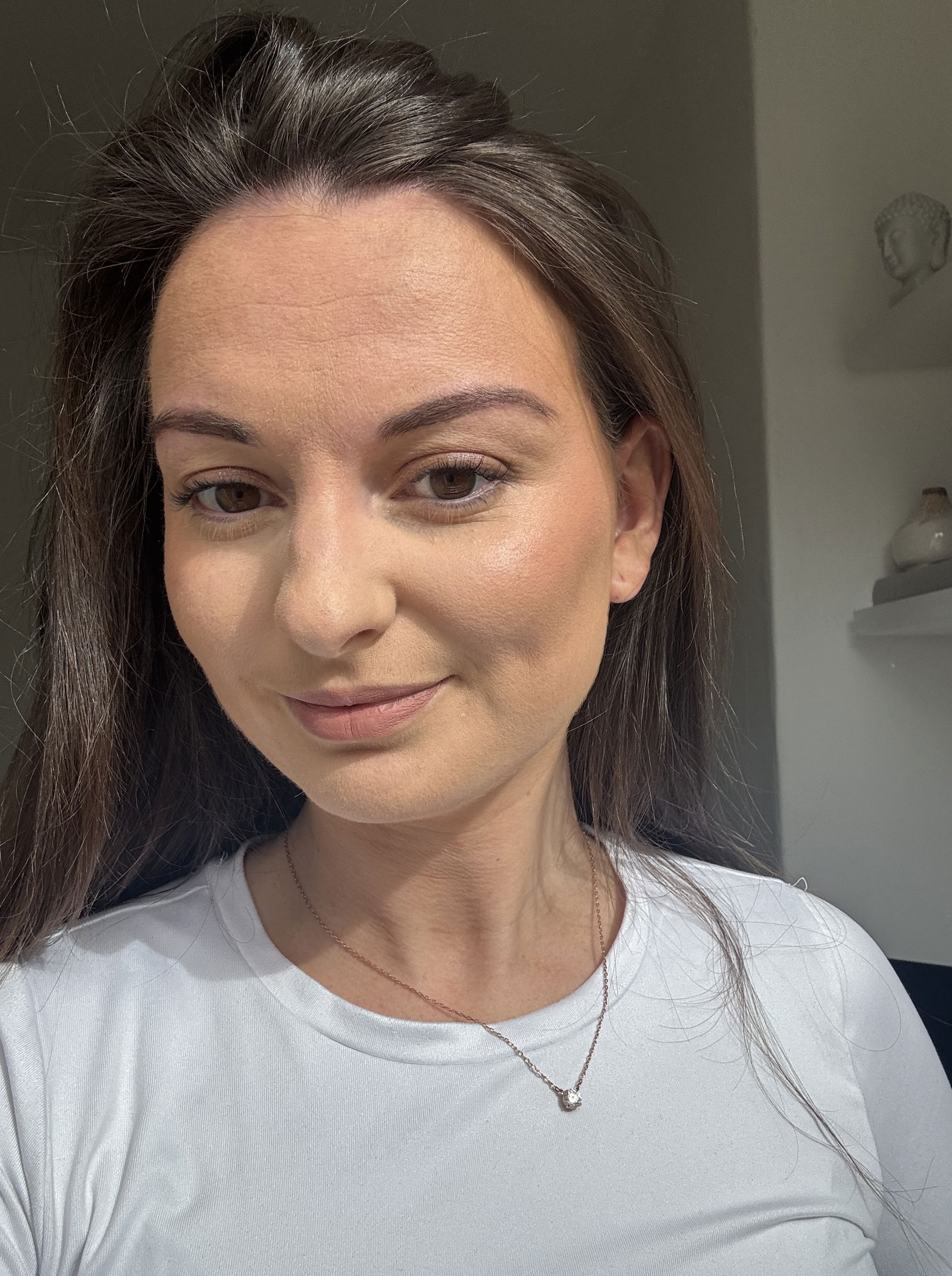 Beauty journalist wearing Charlotte Tilbury's Spotlight Beauty Light Wand