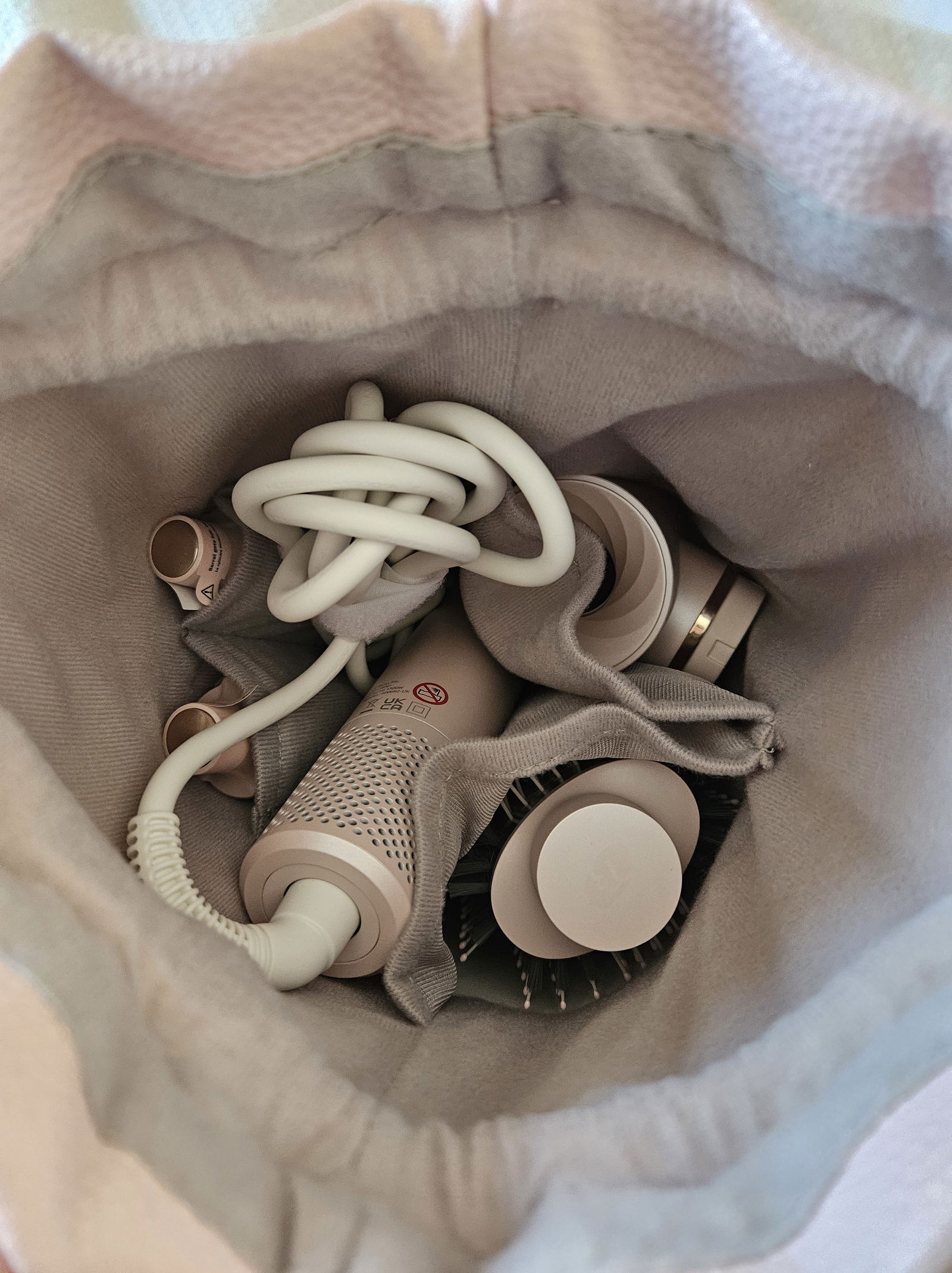 T3's Aire 360 vegan leather storage tote with attachments