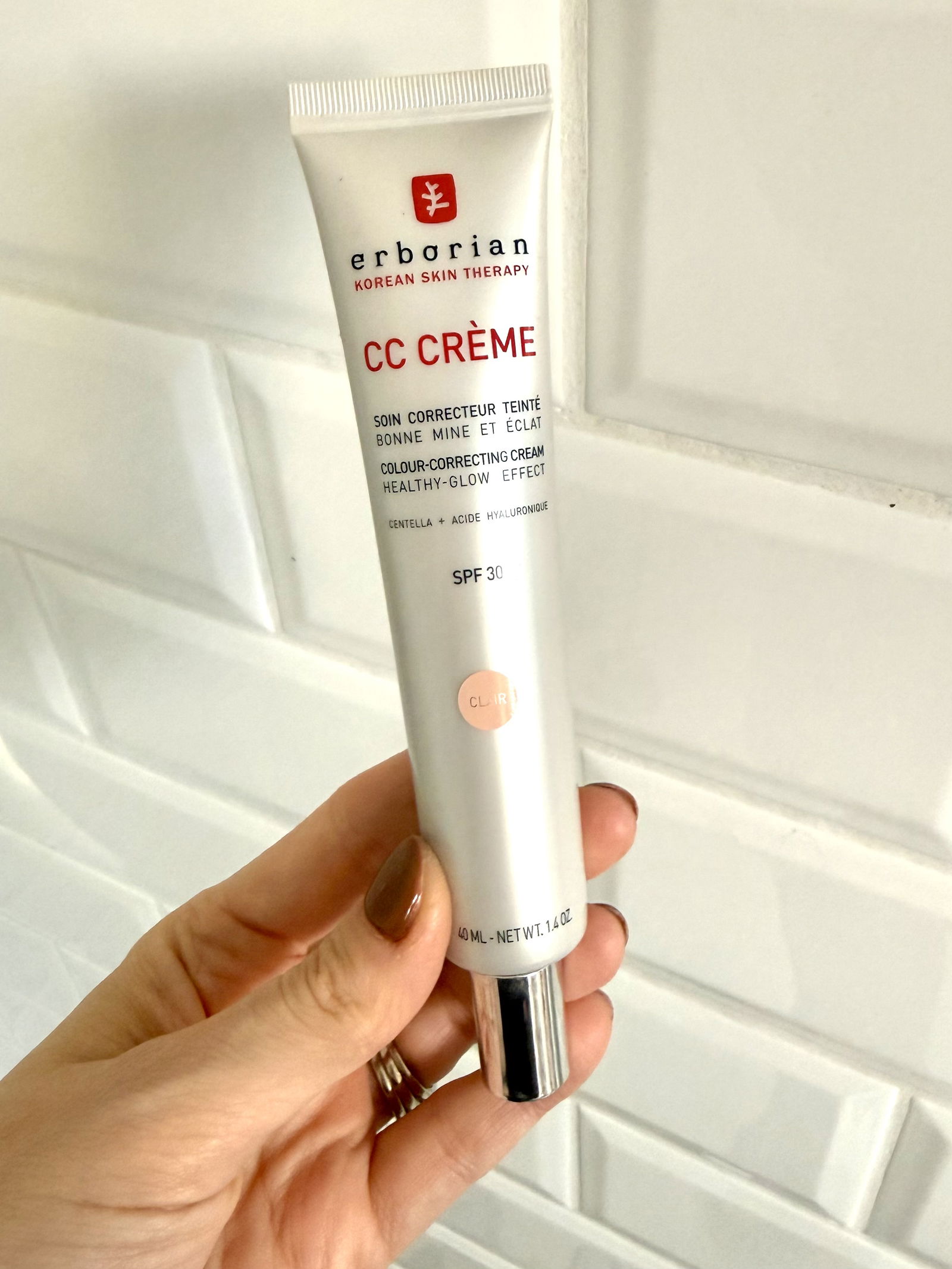 Erborian CC Cream packaging held in hand